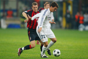 Oscar Minambres of Real Madrid and Andrei Shevchenko of AC Milan